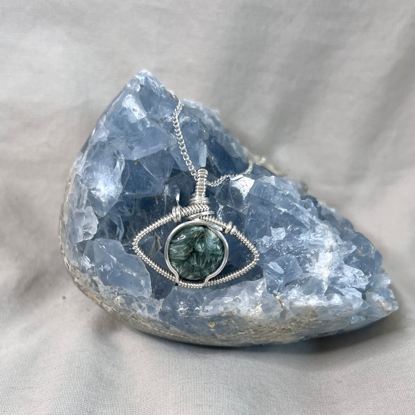 "Bye Bye Bad Vibes" - Seraphinite Evil Eye Pendant