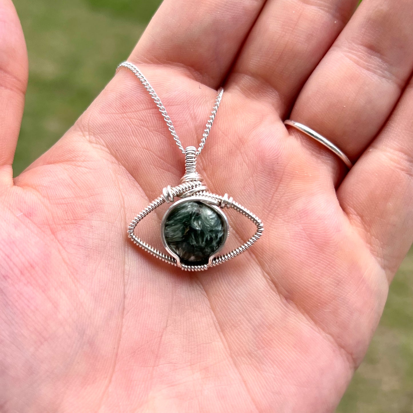 "Bye Bye Bad Vibes" - Seraphinite Evil Eye Pendant